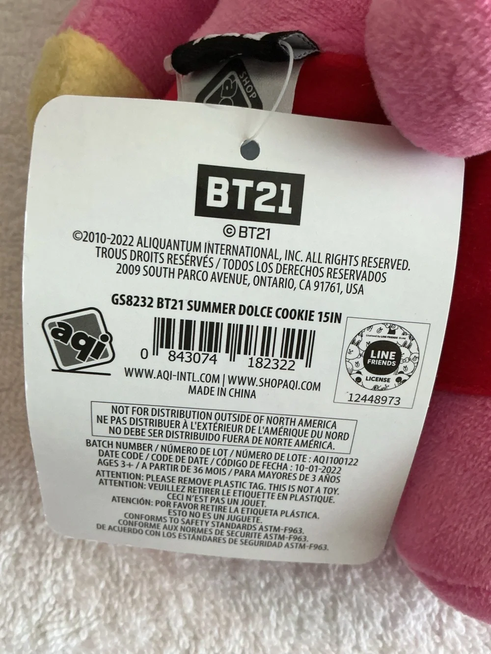 Bright Pink Plush Bunny Character Toy with Red Shorts